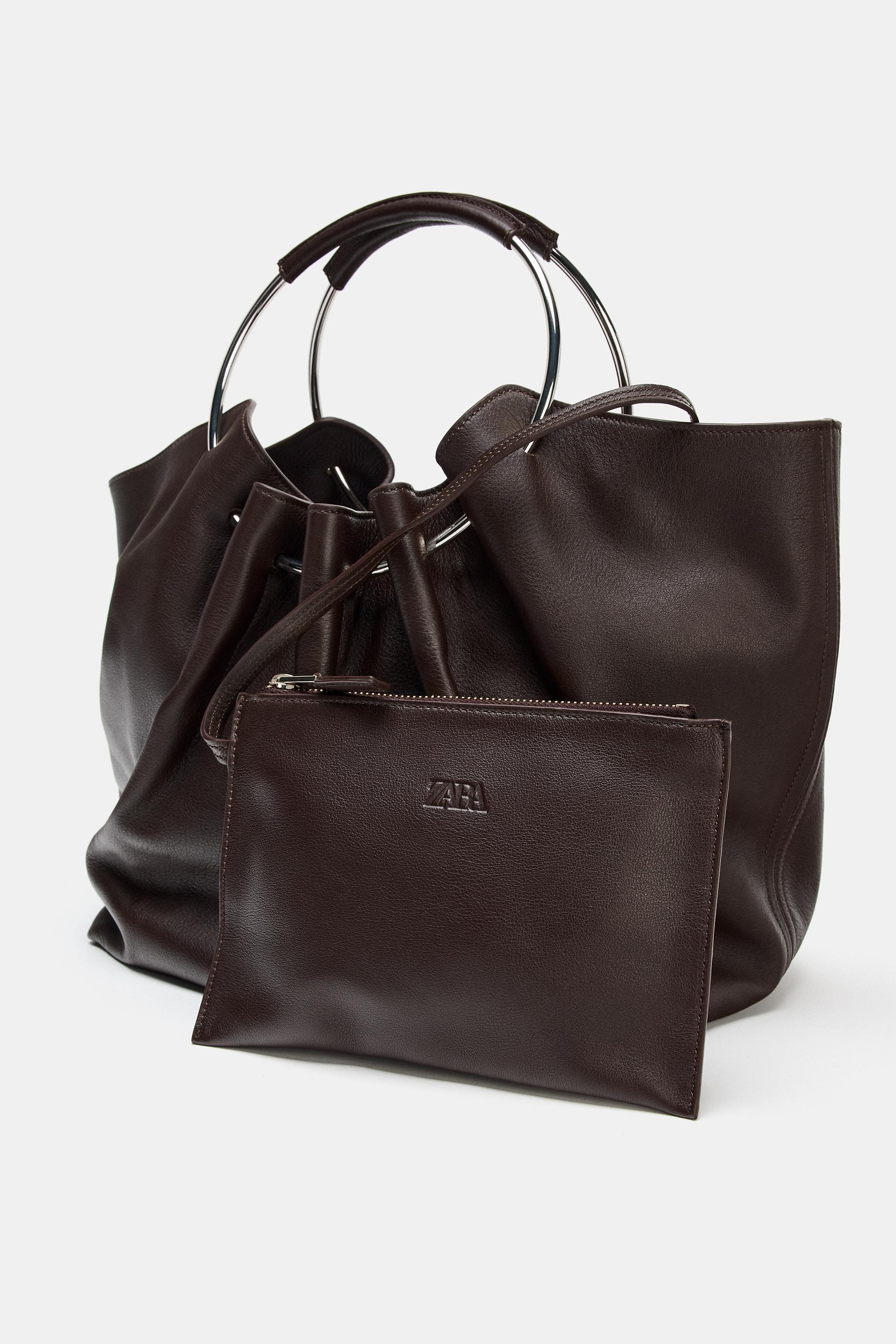 LEATHER BUCKET BAG WITH RIGID HANDLE